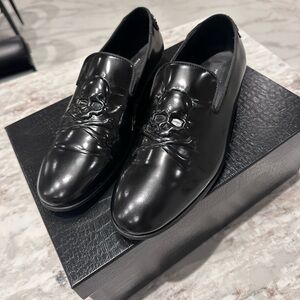Skull branded Phillip Plein dress shoes